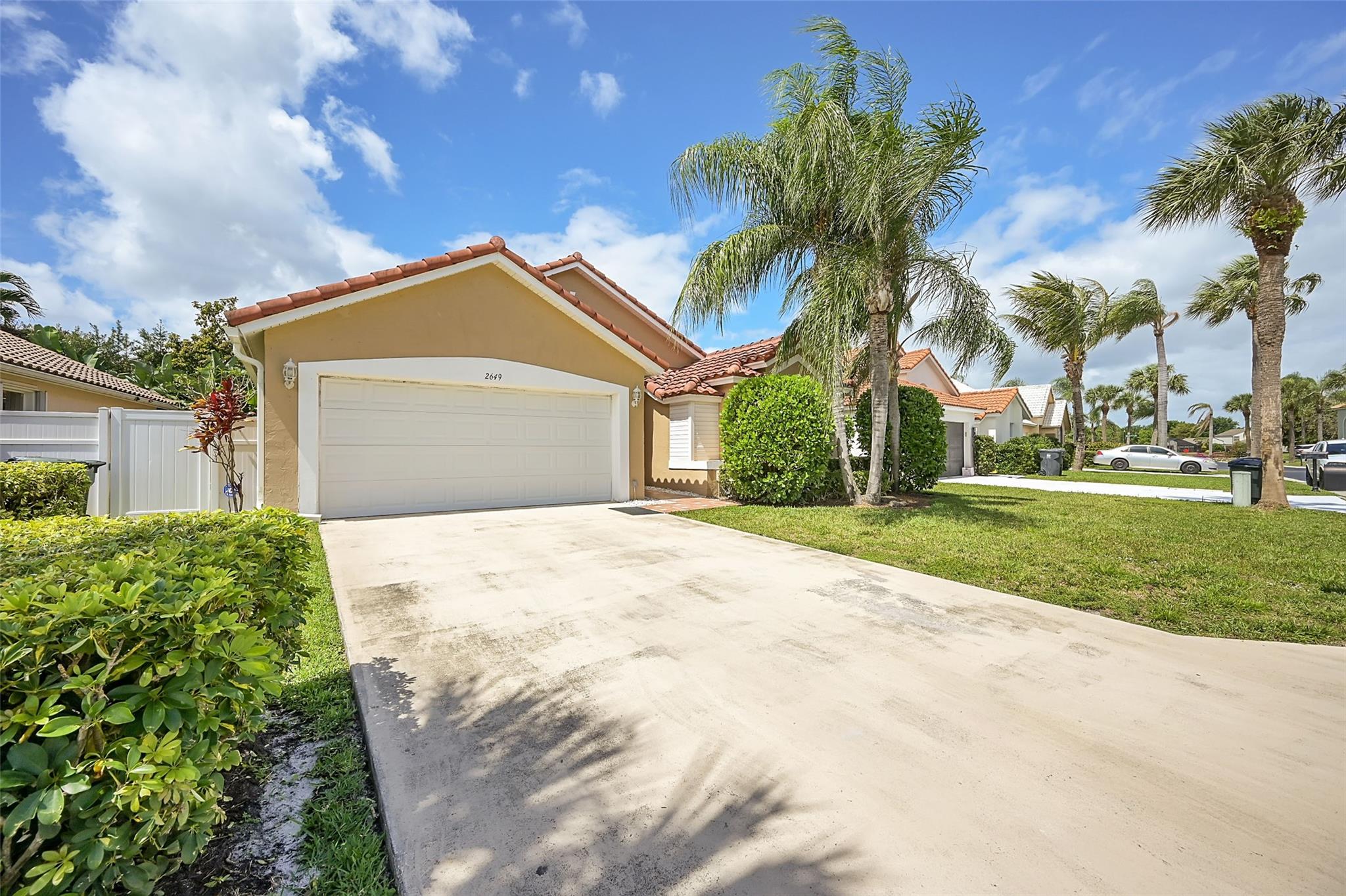 AVAILABLE NOV. 1ST - With its prime location, this home is more than just a place to live "it's a lifestyle". Discover this gem a single-family 3 Bed / 2 Bath home offering the perfect blend of comfort and convenience. Located across the street from the Global Dressage and less than 5 minutes from the PBIEC this home places you at the center of all that Wellington has to offer. Step into a spacious open-plan living area with vaulted ceilings. The heart of the home is the modern kitchen, featuring granite countertops, stainless steel appliances, and a cozy breakfast nook framed by bay windows perfect for enjoying your morning coffee. Glass sliding doors lead to a fenced backyard, ideal for family gatherings.