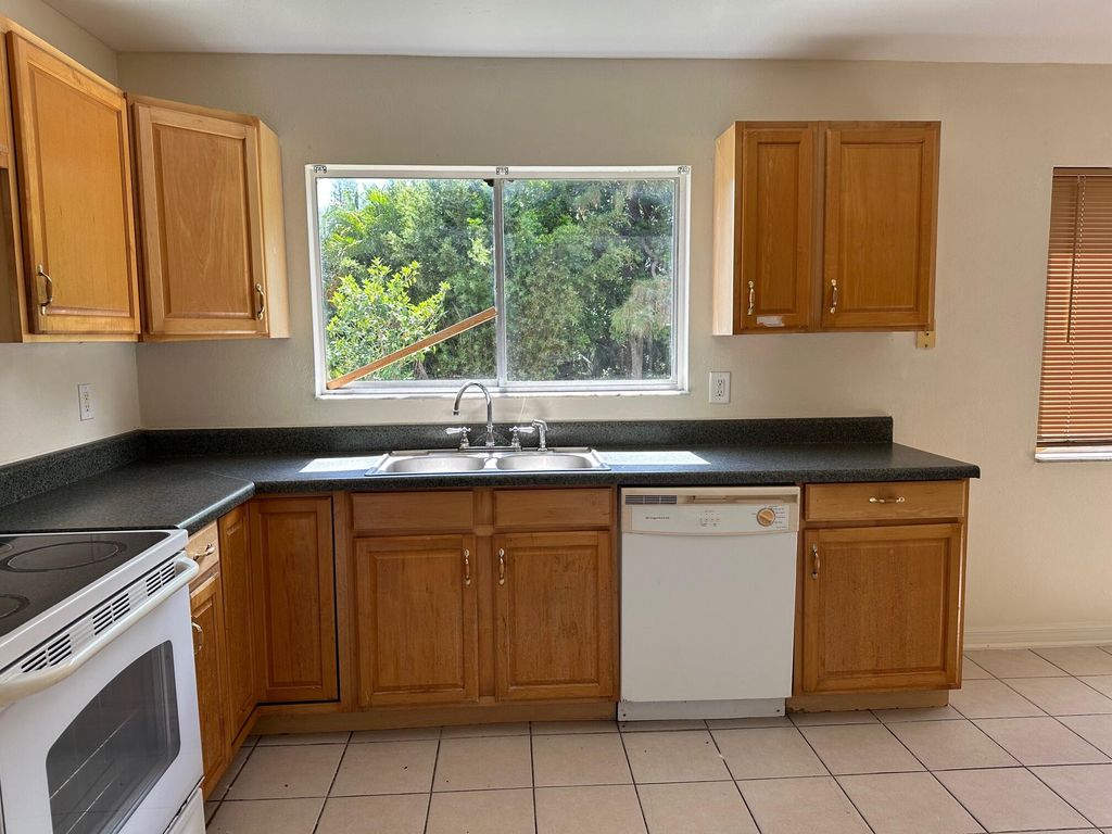 Photo of 1913 SE Redwing Circle, Port Saint Lucie, FL 34952 (MLS # R11007499)
