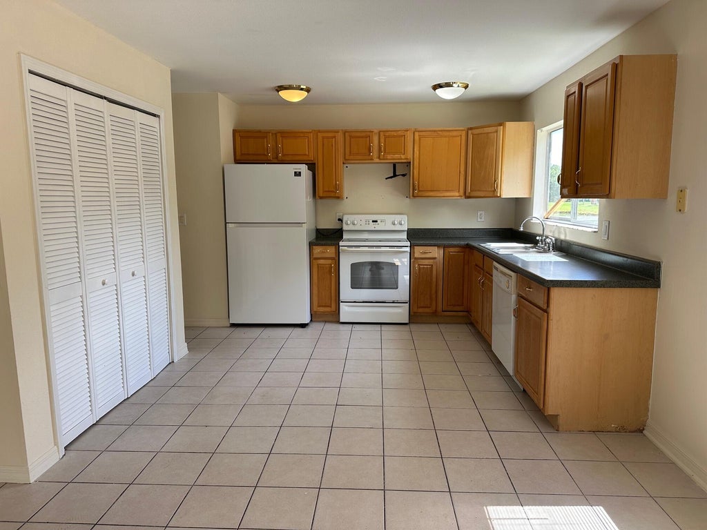Photo of 1913 SE Redwing Circle, Port Saint Lucie, FL 34952 (MLS # R11007499)
