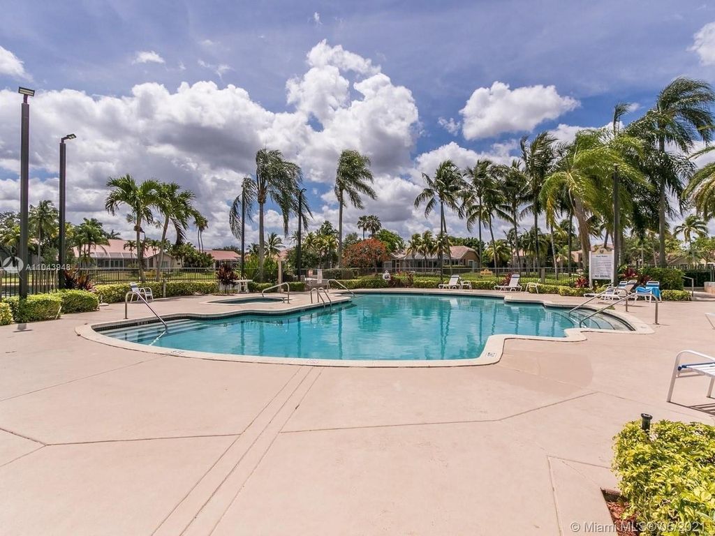 Photo of 1043 Laguna Springs Dr, Weston, FL 33326 (MLS # F10542523)