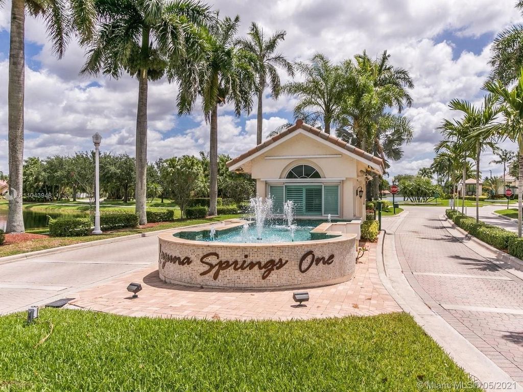 Photo of 1043 Laguna Springs Dr, Weston, FL 33326 (MLS # F10542523)
