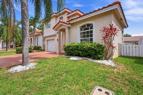 Photo of 4529 NW 60th Court, Coconut Creek, FL 33073 (MLS # B26036227)