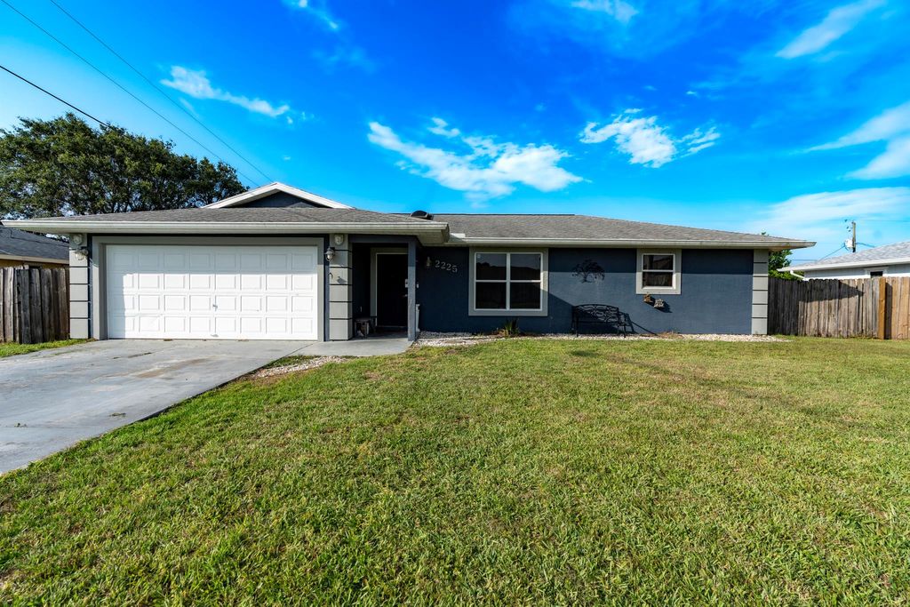 Photo of 2225 SE Trillo Street, Port Saint Lucie, FL 34952 (MLS # R10992618)