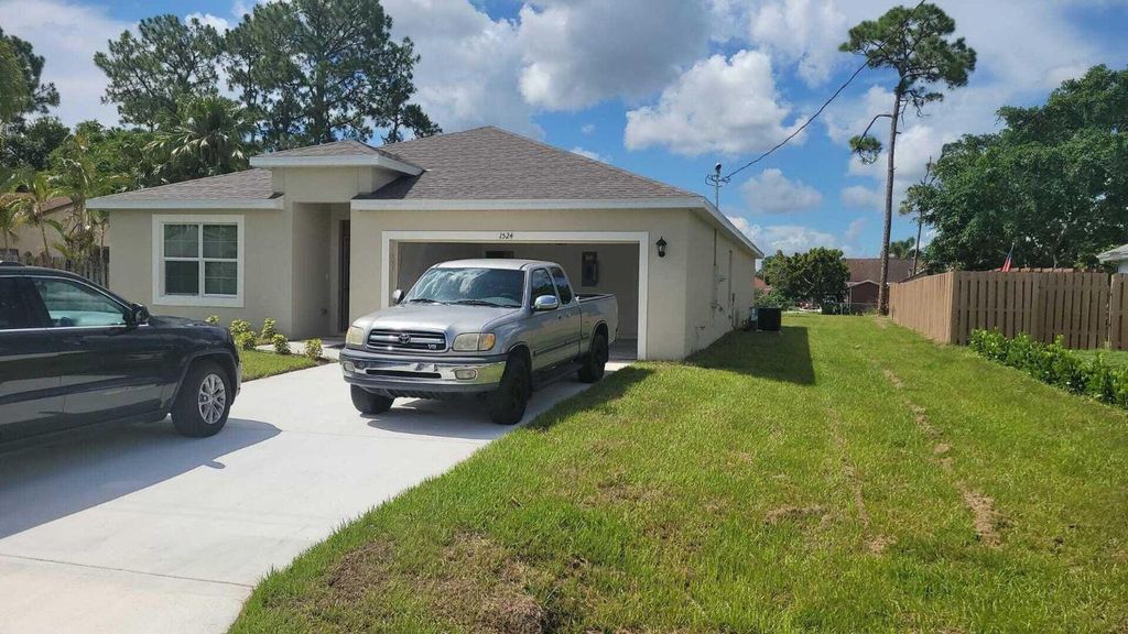 Photo of 4058 SW Jaqust Street, Port Saint Lucie, FL 34953 (MLS # R11157551)