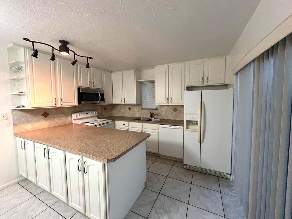 Photo of 5502 Waterview Circle, Palm Springs, FL 33461 (MLS # R11095285)
