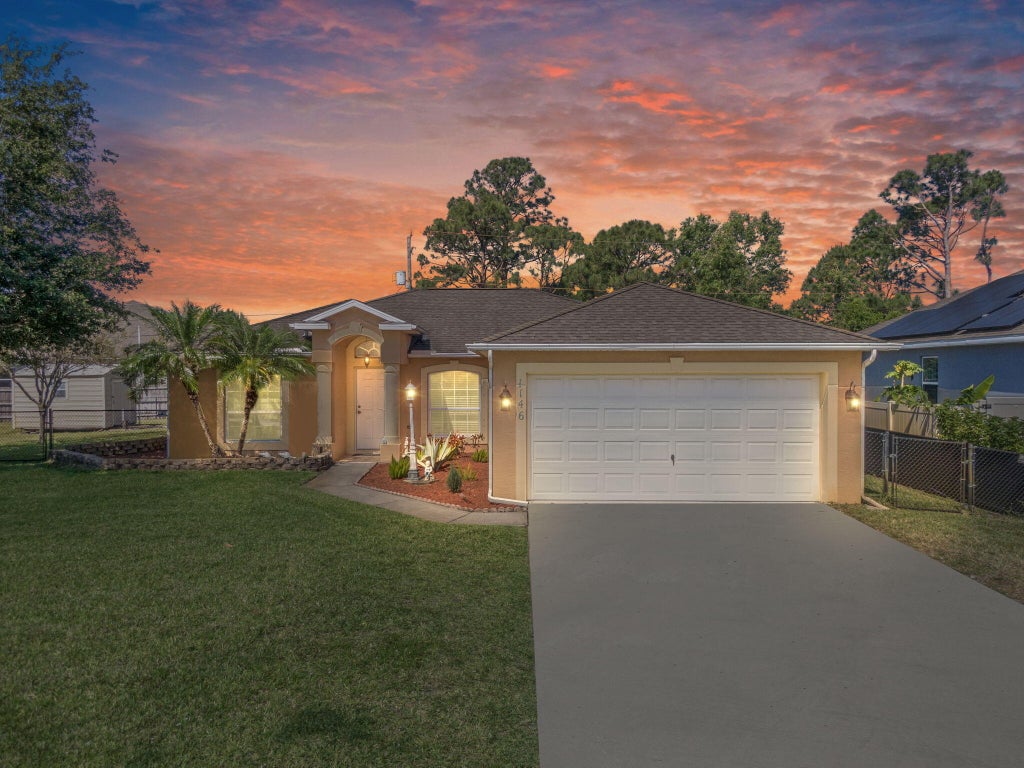 Photo of 1146 SW Kalevala Drive, Port Saint Lucie, FL 34953 (MLS # R11084309)