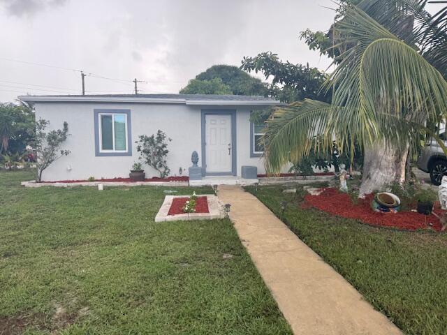 great income ' welcome to your new home in the heart of west palm beachs ! This spectacular remodeled house combines modern design ,comfort and efficiency . Whit high quality finishes and a spacious distribution ,it is the perfect option for those looking to move without the need for additional renovation FEATURED FEATURED Completely remodeled ready to live in moder kitchen with new cabinets and ceramic backsplash new tile floors thoughout the house updated bathrooms with elegant finishes impact windows and skylights greater safety and naturallight new roof and recent air conditioning for great efficiency large backyard ideal for meetings or future extensions
