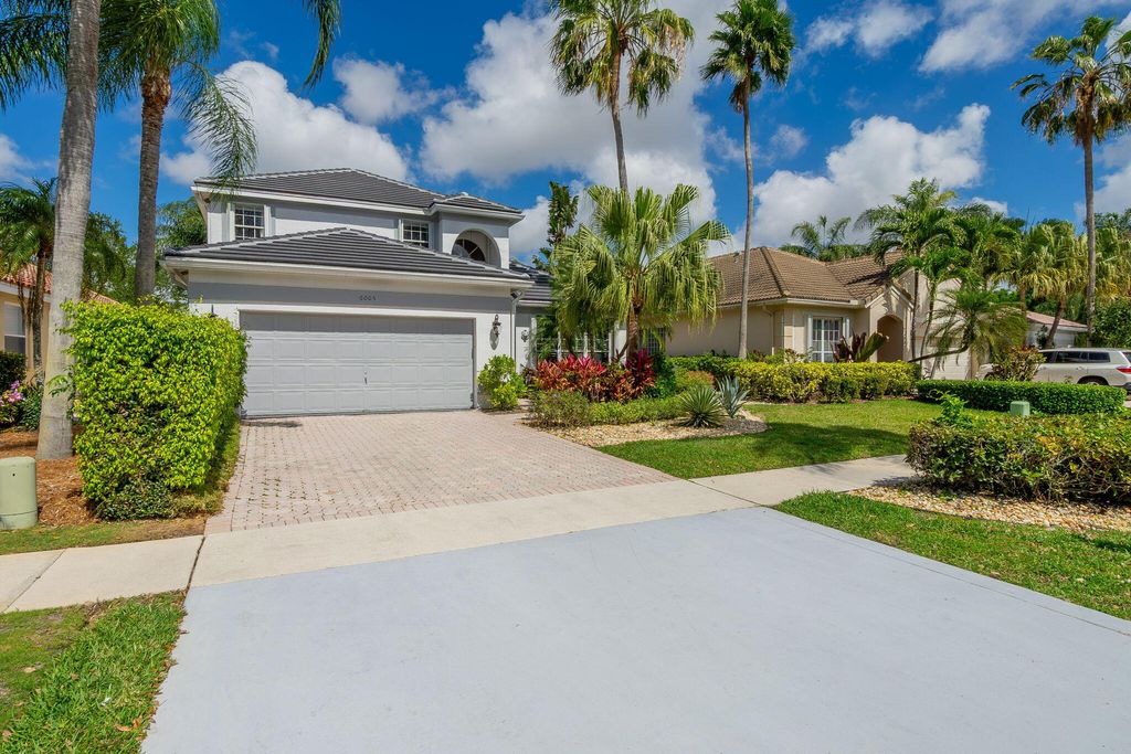 Photo of 6005 Newport Village Way, Lake Worth, FL 33463 (MLS # B26000907)