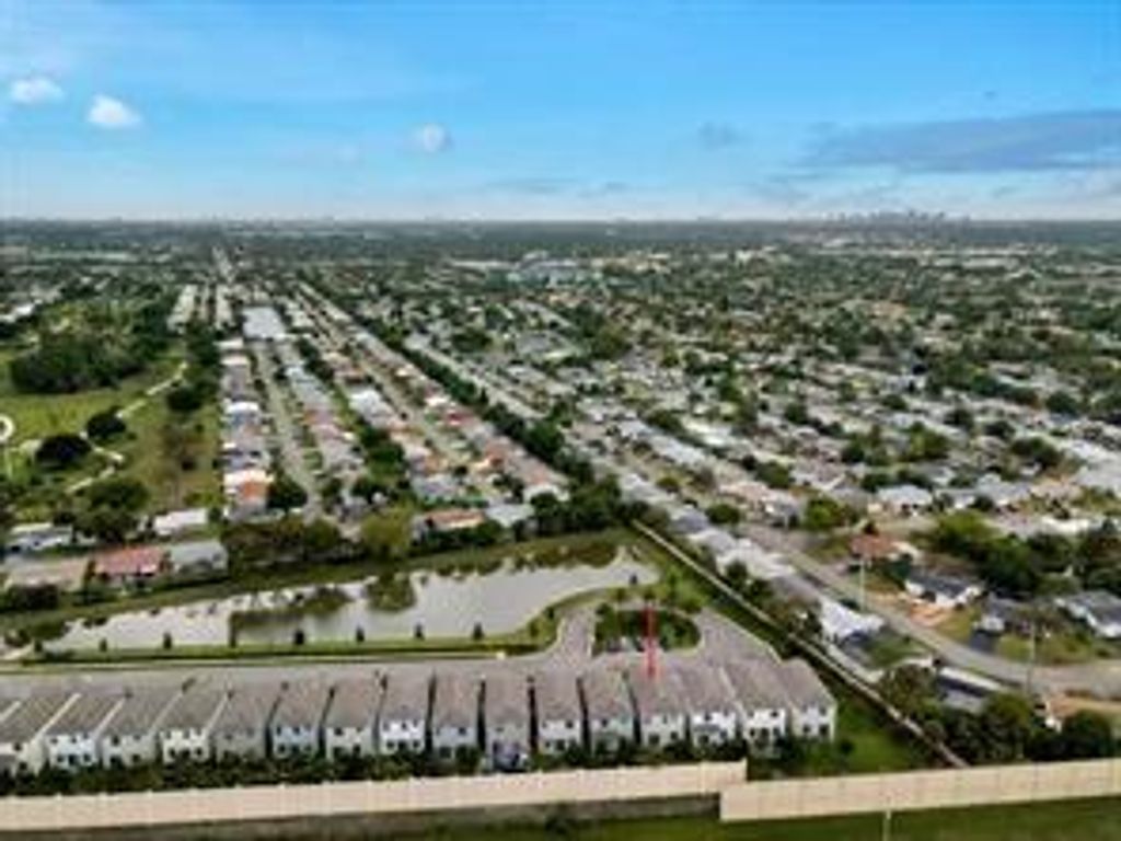 Photo of 4407 NW 48th Terrace, Tamarac, FL 33319 (MLS # B26029471)