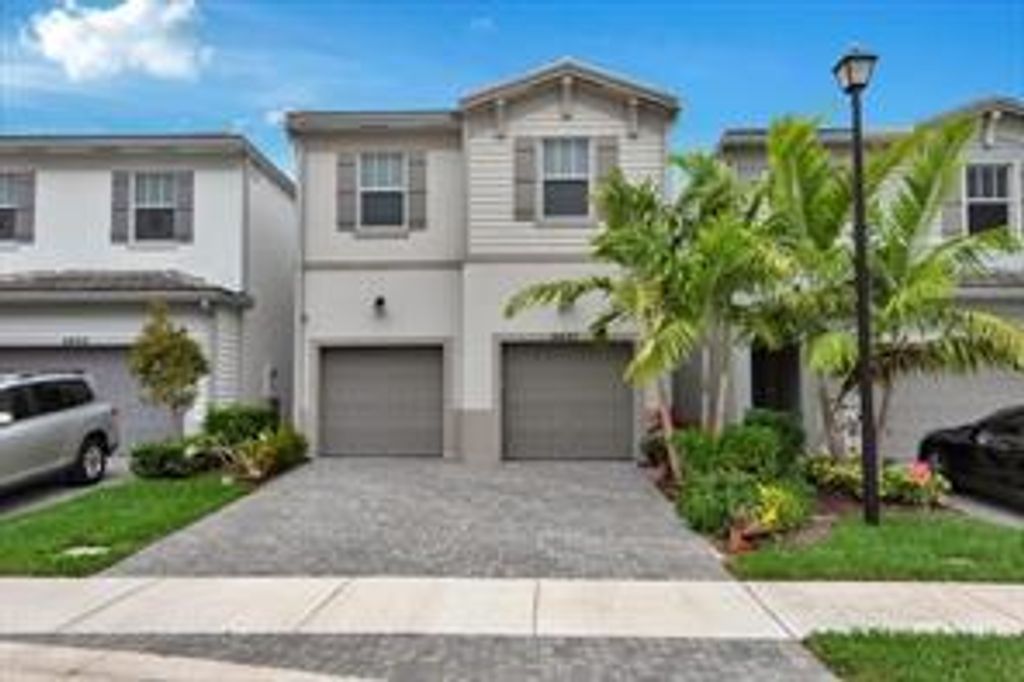 Photo of 4407 NW 48th Terrace, Tamarac, FL 33319 (MLS # B26029471)