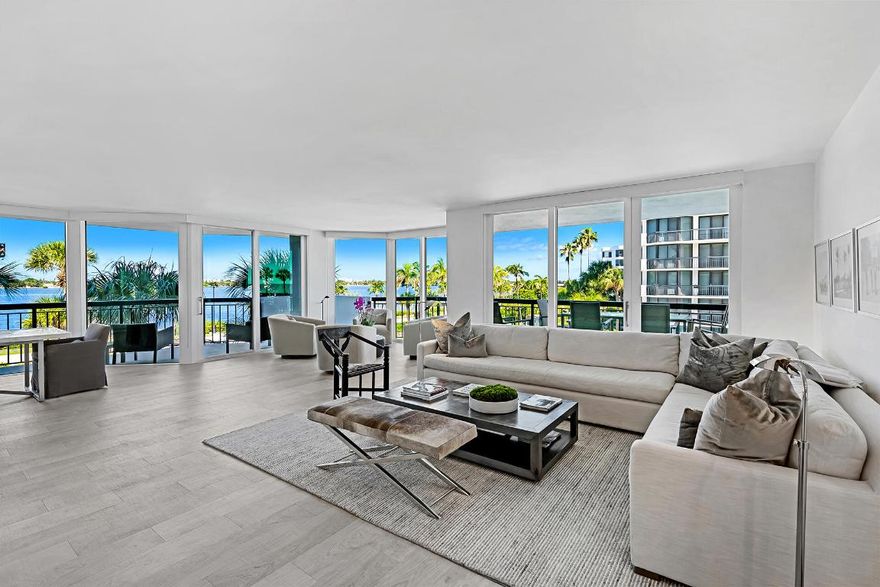 Enjoy water views and magical sunsets from every room of this immaculate unit in the prestigious Carlton Place just a few steps from the Four Seasons Hotel in Palm Beach. Clean, modern interior designed by noted Hamptons architect, James D'Auria. Easy entertaining from two living areas, stunning dining area and custom built bar. Modern kitchen with Miele appliances. Ample closets and storage throughout. Primary suite features two walk-in closets, double vanity, huge shower, deep soaking tub and separate large water closet. Two additional bedrooms, both ensuite. Building has been totally renovated with a resort style pool and spa, lounge area overlooking the ocean, gym and party room. Fully secure, guard gated with the best managers in Palm Beach on site. Concrete restoration completed!
