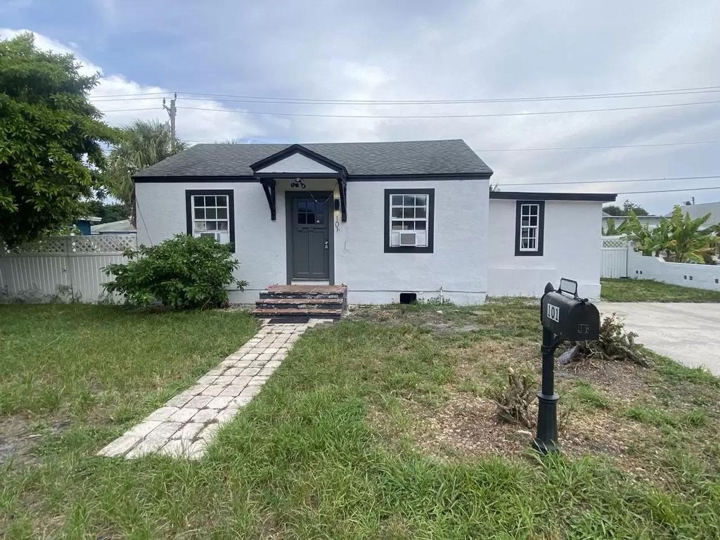 Photo of 101 E 28th Street, Riviera Beach, FL 33404 (MLS # R11147154)