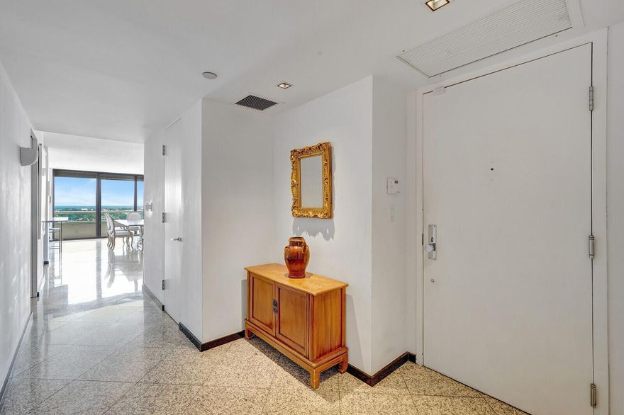 Large double unit. A unique opportunity to renovate and live in this condominium residence. More than 4,000 square feet with a sensible floor plan overlooking the Intracoastal, ocean and downtown city area. A full service building featuring two pools, large exercise facility, 24 hour security, valet parking and more. Great opportunity.