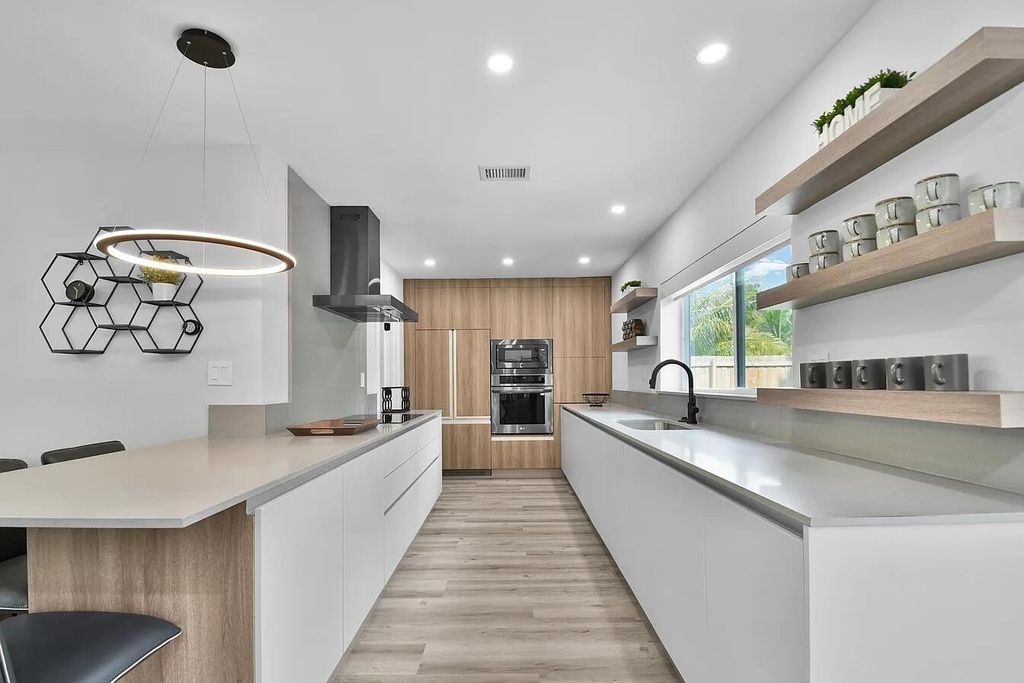 Photo of 803 Bluebird Drive, Delray Beach, FL 33444 (MLS # R11144389)