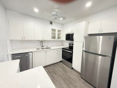 Photo of 345 WELLINGTON H #345, West Palm Beach, FL 33417 (MLS # B26092709)