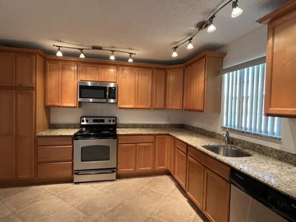 Photo of 1301 Hempstead Street, Wellington, FL 33414 (MLS # B26016308)