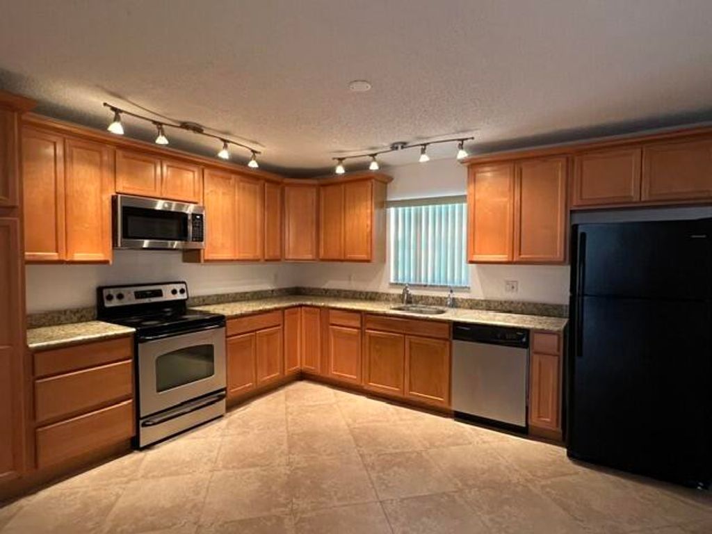 Photo of 1301 Hempstead Street, Wellington, FL 33414 (MLS # B26016308)