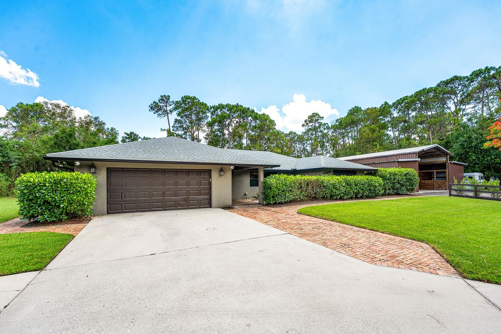 Photo of 13530 N 59th Ct Court N, The Acreage, FL 33411 (MLS # B26030525)