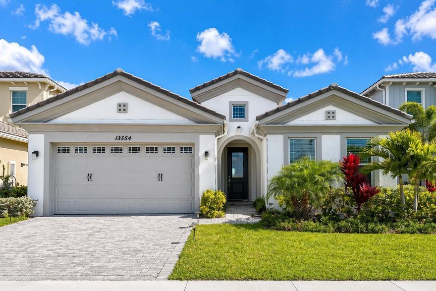 This Cassia model offers 3 bedrooms and 2 bathrooms with a functional, open layout designed for comfortable everyday living and easy entertaining. The main living areas feature upgraded flooring, while the bedrooms are finished with carpet for added comfort. The kitchen is well-appointed with upgraded quartz countertops, a wall oven, electric cooktop, and ample space for cooking and gathering. Additional highlights include impact windows for added peace of mind and energy efficiency. The outdoor space has been expanded with an extended screened lanai, combining a covered area with additional open space to enjoy the peaceful lake view. Built in 2024, this almost-new home is located in the sought-after community of Westlake, known for its incredible amenities, including resort-style pools,  fitness center, Adventure Park, and more, all with a low HOA fee. This property is being offered as a short sale, presenting a unique opportunity for buyers to secure a great home in a growing area. Multiple offers will be considered - bring all offers.