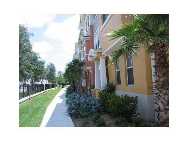 Spacious three story 2BR 2.5 bath townhouse with den & 1 car garage. HOA includes HD cable, dark fiber internet, water, 24 hr manned gate, full impact windows, Washer/dryer. Up to 2 pets allowed with a combined weight of 50 lbs or less. No individual pet over 40 lbs, no aggressive breeds. Tenants must carry renters insurance w/ $100,000 liability.Cityside offers resort-style living with remodeled 24 hour state of the art fitness center, clubhouse with full size catering kitchen available for private parties, pool, grill pavilion, 24/7 manned security, 1.7 mi lakefront running track and more. Located only minutes to beaches, Downtown WPB, shopping, dining, nightlife & 5-min to PBI Airport. Easy access to I95.
