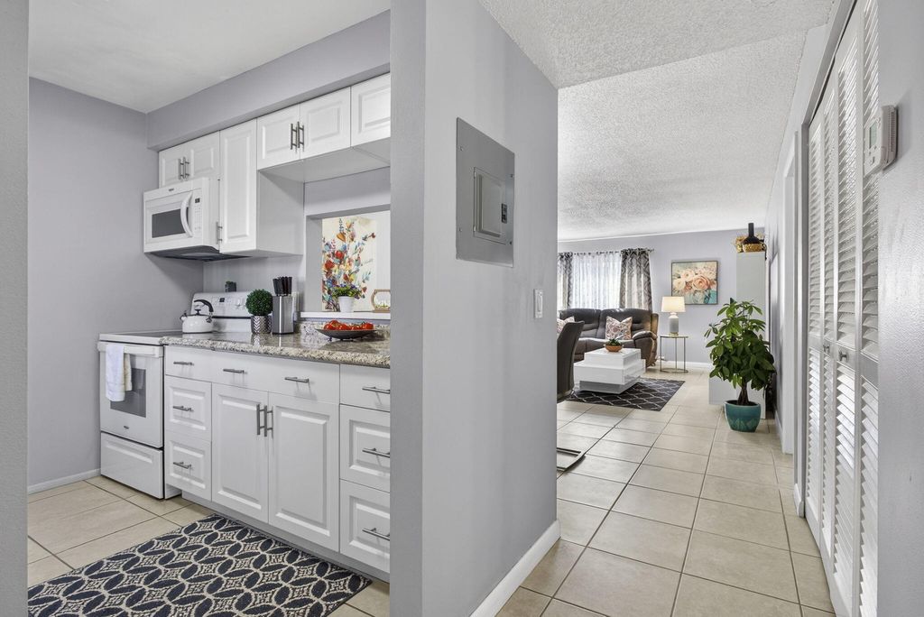 Photo of 12020 W Greenway Drive #102, West Palm Beach, FL 33411 (MLS # R11165838)