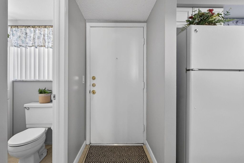 Photo of 12020 W Greenway Drive #102, West Palm Beach, FL 33411 (MLS # R11165838)