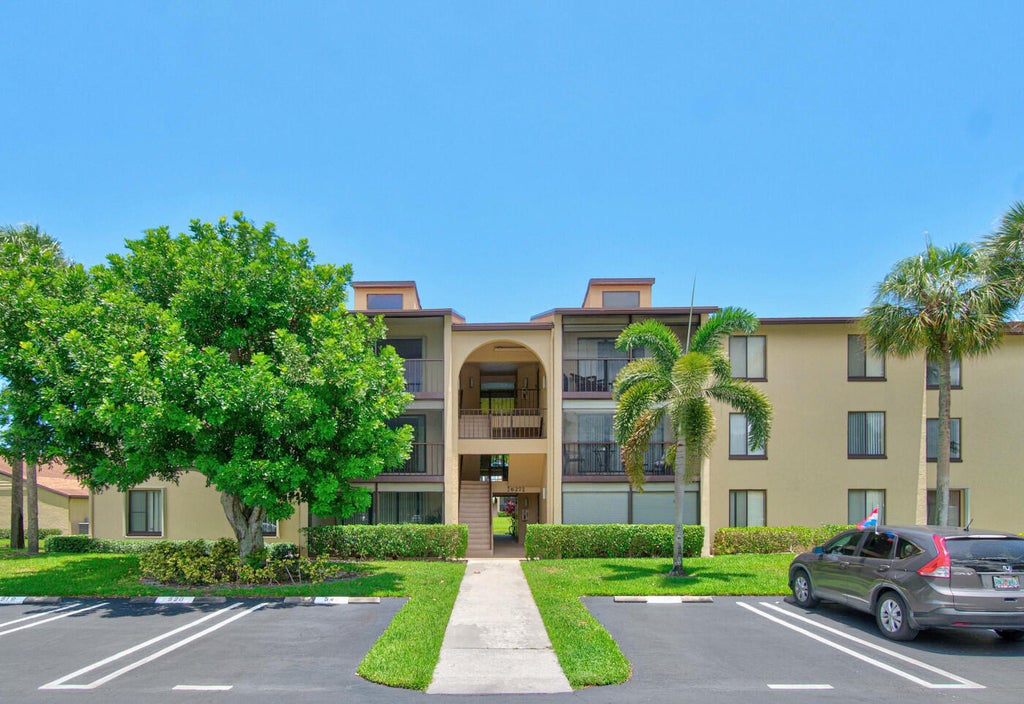 Photo of 627 Sea Pine Way #A3, Greenacres, FL 33415 (MLS # B26044696)