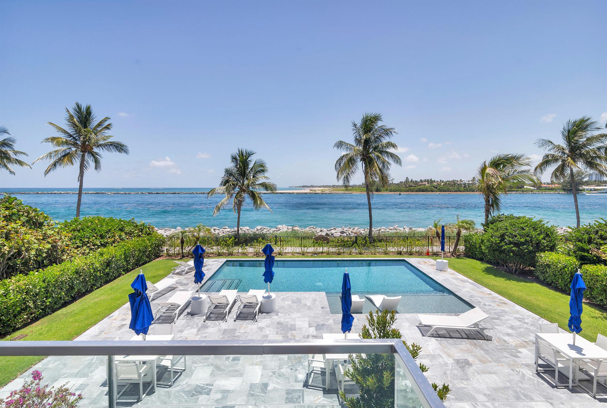DIRECT OCEAN/PALM BEACH INLET VIEWS. New construction 2024. This modern contemporary (3 br 3.5 ba corner unit with den/office) offers incredible direct views of both the Atlantic Ocean and Palm Beach Inlet. The interior feature's a wide open floor plan, 9 ft ceilings, impact glass windows/doors, abundance of natural light, private elevator, high end appliance package, water filtration system, electric roller shades and more! Exterior feature's gated entry, large pool/ sundeck overlooking the ocean, 2 designated parking spots. Building is Pet friendly with no weight restrictions. Located in charming historic Town of Palm Beach Shores known for its pristine beaches and warm island breezes and Just minutes away from the Sailfish Marina, great shopping, and restaurants...