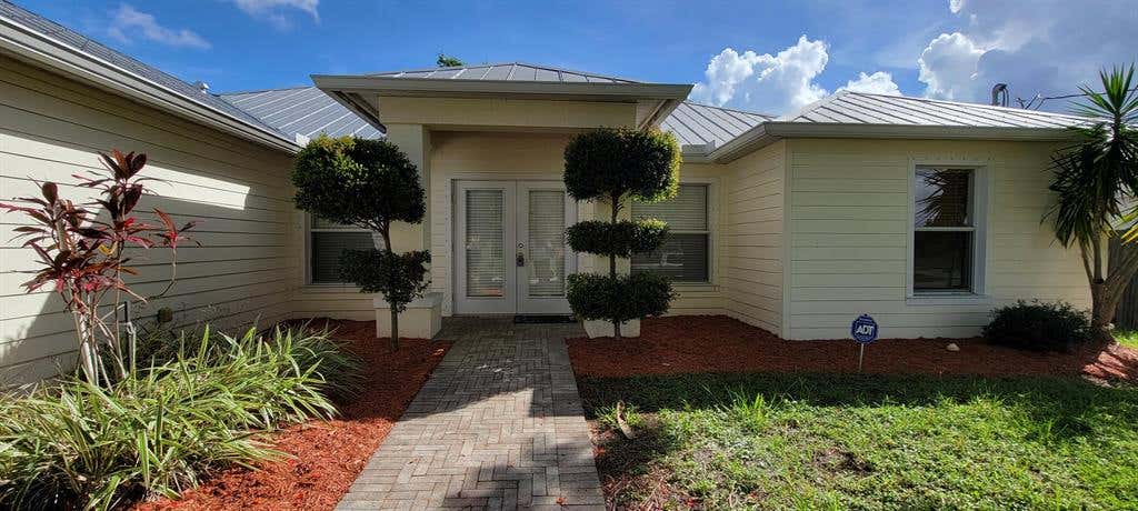 Photo of 211 SW Amesbury Avenue Ave, Port Saint Lucie, FL 34953 (MLS # R10813609)