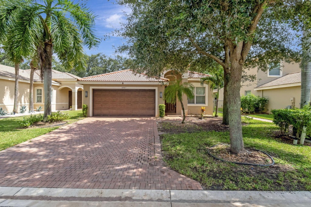 Photo of 10947 BITTERNUT HICKORY Lane, Boynton Beach, FL 33437 (MLS # B26091500)