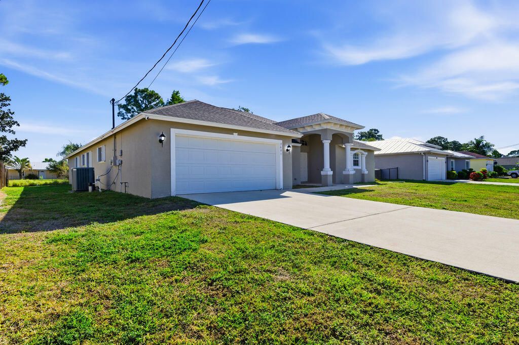Photo of 3601 SW Europe Street, Port Saint Lucie, FL 34953 (MLS # R11159165)