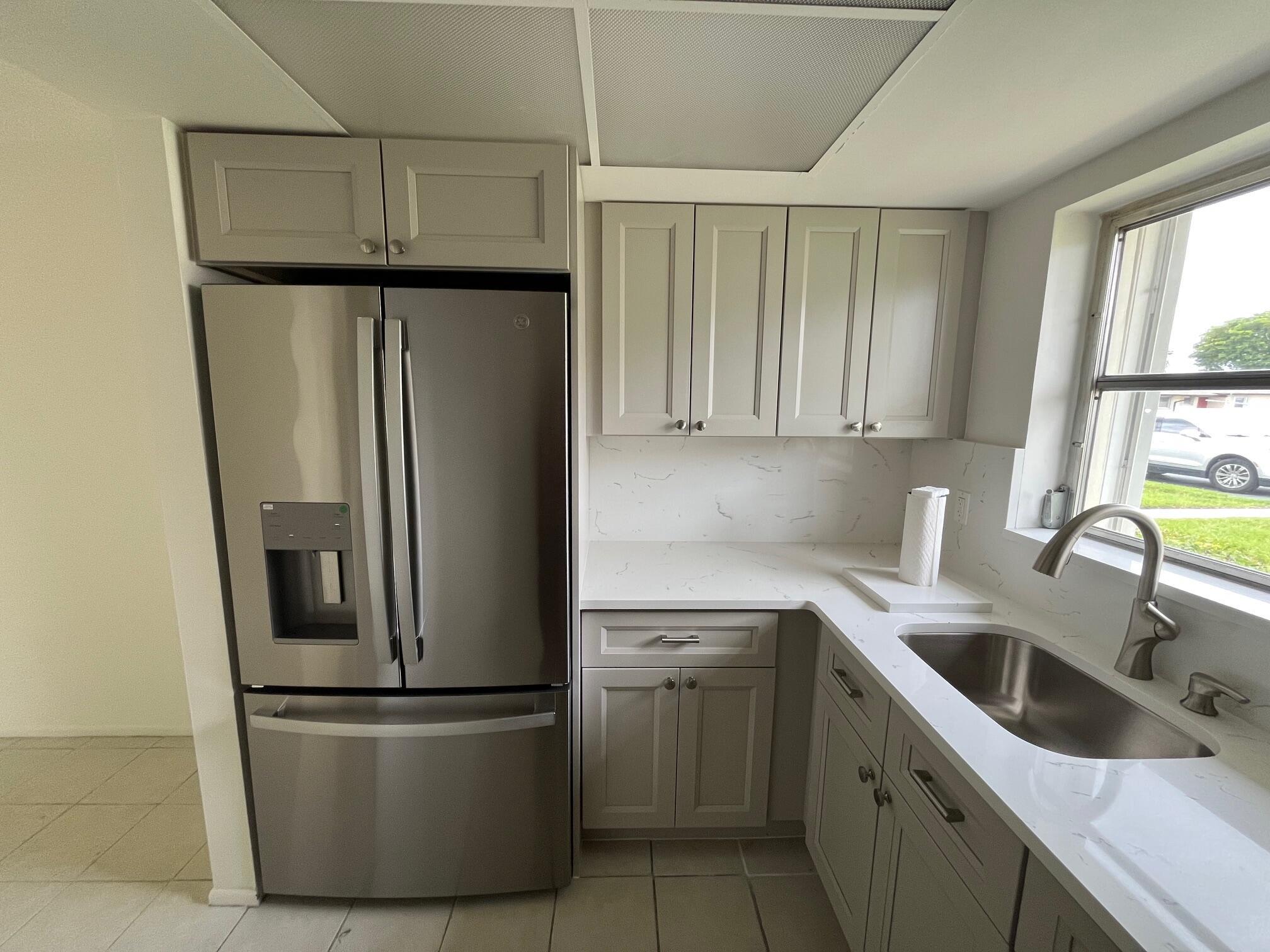 Explore this beautiful villa in the West Palm Beach area. Walk to Shops, Grocery Stores and Bus Stop. The amenities are enough to keep you busy all day long. The beautiful, heated pool is open year-round. Pool tables, card room, library and social events to be enjoyed by everyone. This villa has it all. Remodeled kitchen, bathroom and all stainless-steel appliances.New roof was installed in 2024 and soffit and facia installed in 2025. Seller has paid the assessment. Very affordable HOA dues which include water, sewage, basic cable. exterior maintenance and insurance on the building. Accordion shutters throughout. HOA requires a 710-credit score and a combined income of $40,000 annually.NO minimum down payment required if financing.