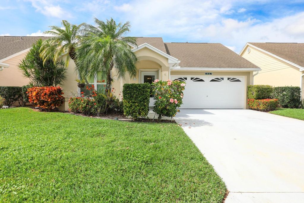 Photo of 1067 NW Tuscany Drive, Port Saint Lucie, FL 34986 (MLS # R10966475)