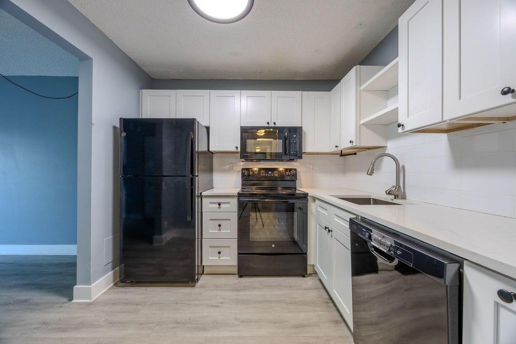 Photo of 9440 SW 8th Street #417, Boca Raton, FL 33428 (MLS # B26044194)