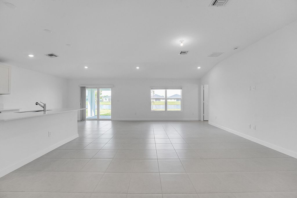 Photo of 6394 NW Windwood Way, Port Saint Lucie, FL 34987 (MLS # B26024598)