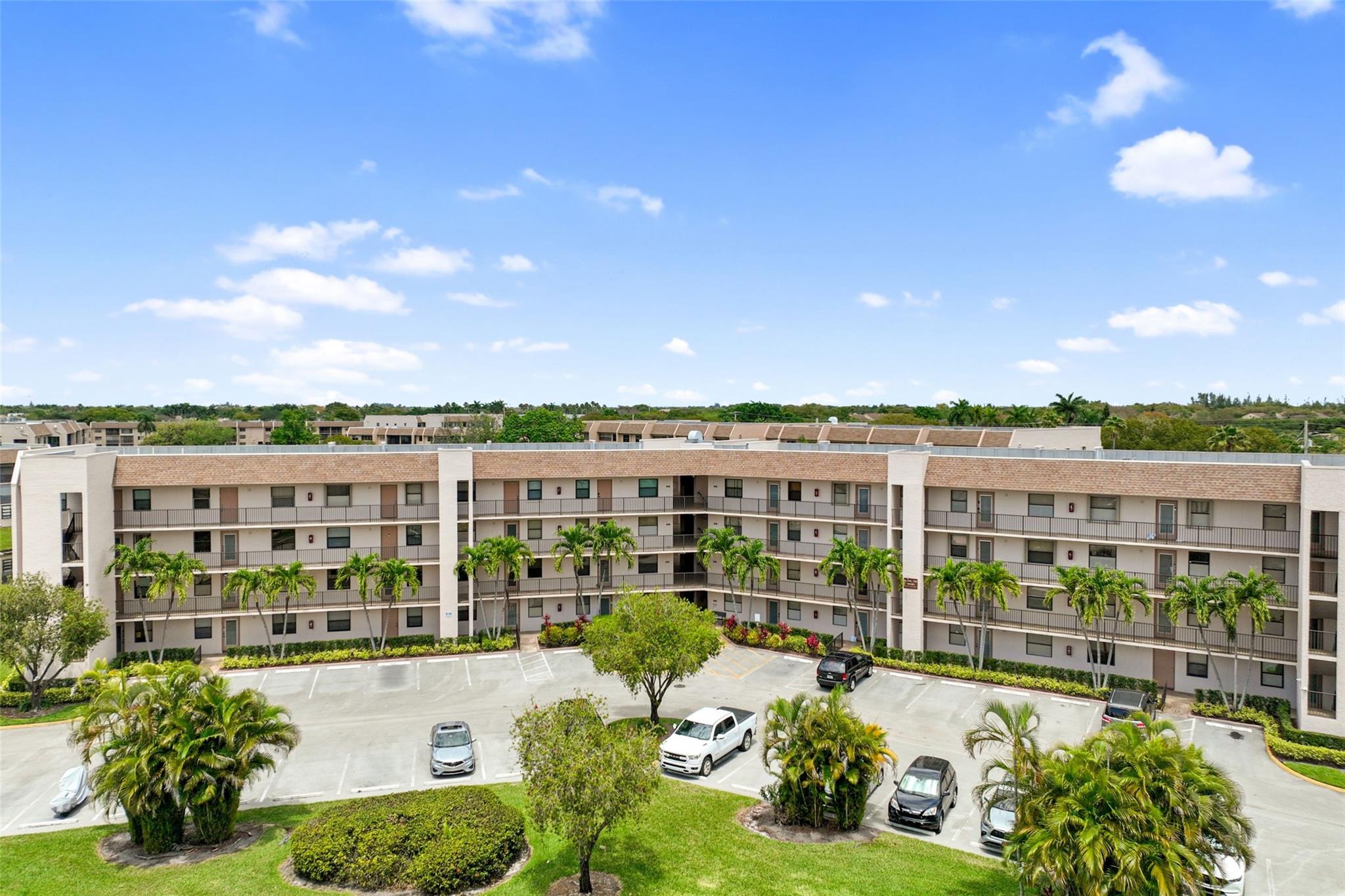 Top-floor 2BD/2BA condo in Sunrise Lakes Phase 4, a 55+ resort-style community in vibrant Sunrise, FL. Enjoy serene golf and lake views from your screened balcony—no upstairs neighbors! This bright unit is freshly painted, features impact windows and doors, and has great bones with loads of potential. Building features a brand-new roof (2024) and elevator (2023). Amenities include a massive 34,000 sqft clubhouse that is right across the building, a heated pool, fitness center, theater, tennis courts, handball, shuffleboards, billiards, craft rooms, and so much more! Multiple satellite clubhouses add to the fun and offer extra space for entertainment and gatherings. Truly find yourself in this peaceful, yet active, and beautifully maintained community. Equal Housing Opportunity!