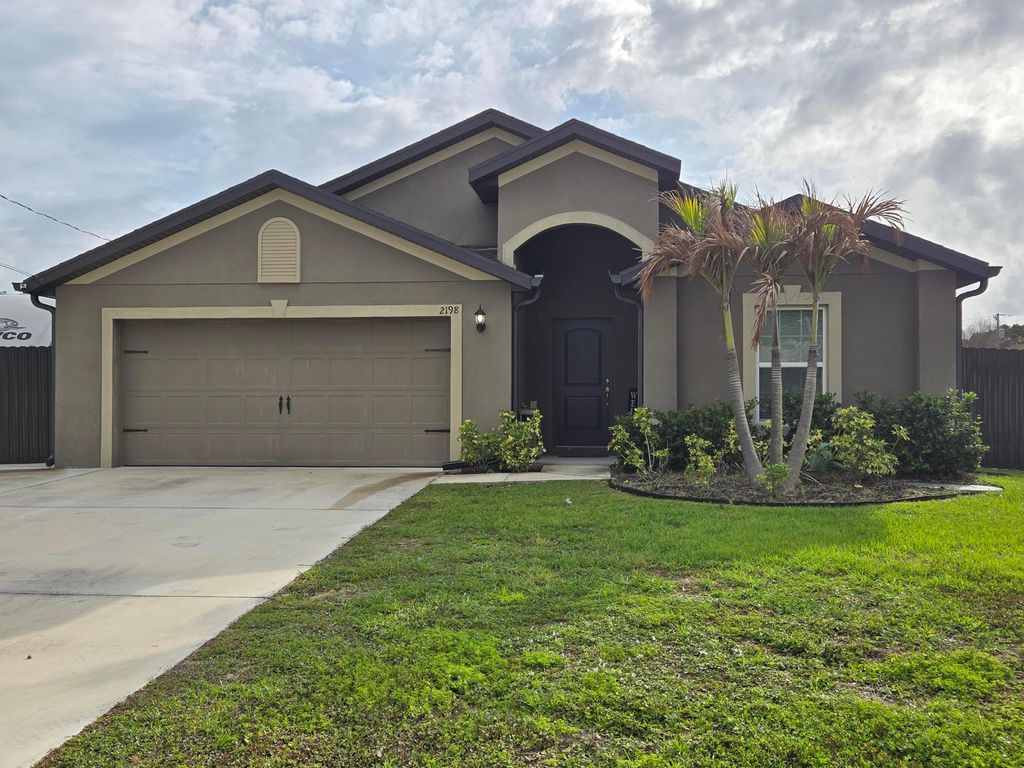Photo of 2198 SW Algiers Street, Port Saint Lucie, FL 34953 (MLS # B26020699)