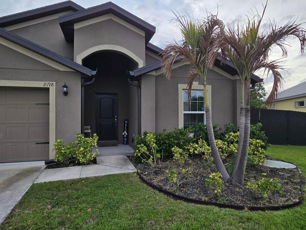 Photo of 2198 SW Algiers Street, Port Saint Lucie, FL 34953 (MLS # B26020699)