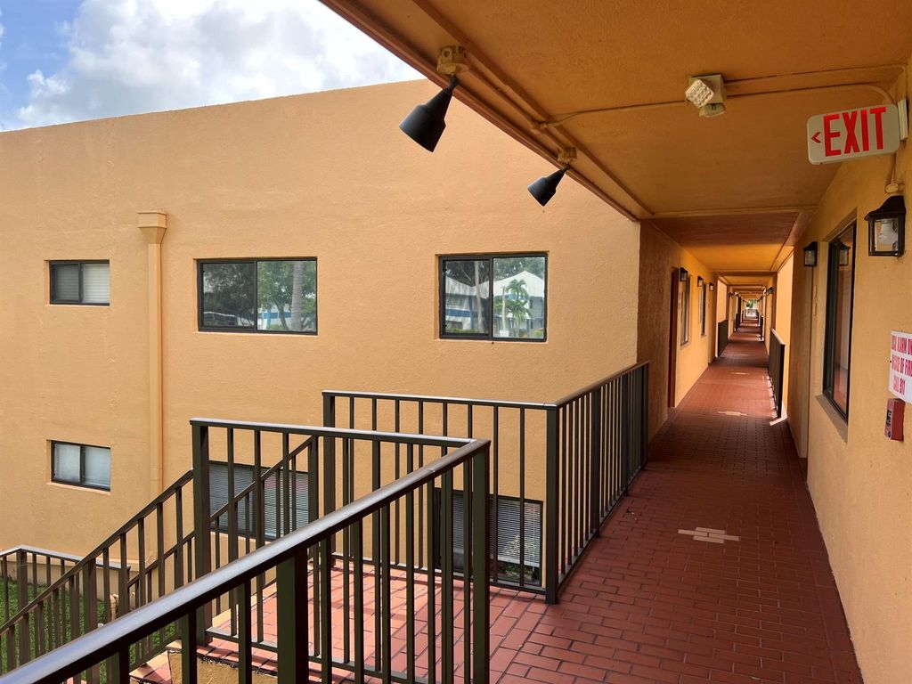 Photo of 15216 Lakes Of Delray Boulevard #143, Delray Beach, FL 33484 (MLS # R10931059)