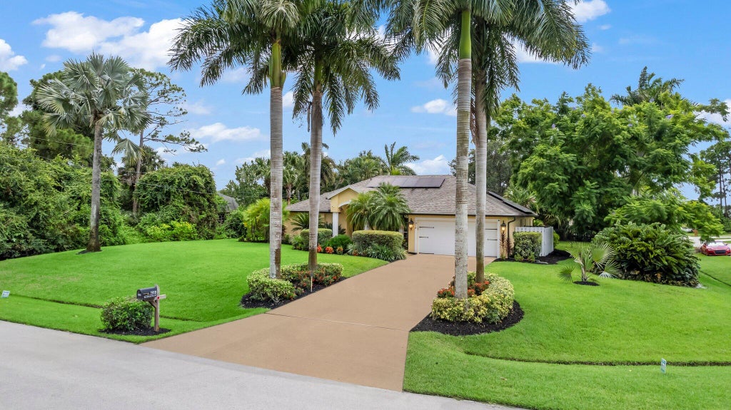 Photo of 1918 SW Bellevue Avenue, Port Saint Lucie, FL 34953 (MLS # R11017004)