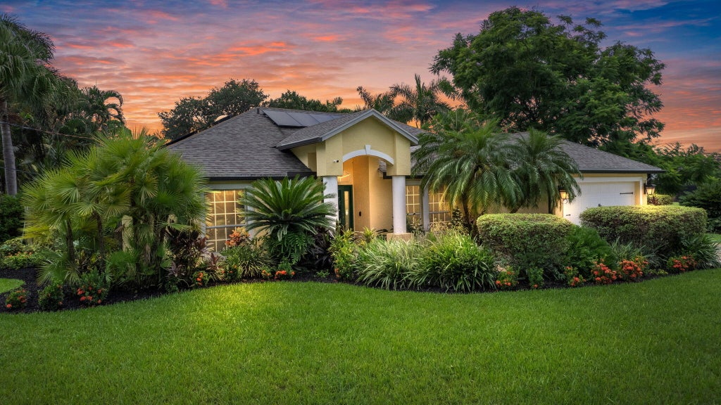 Photo of 1918 SW Bellevue Avenue, Port Saint Lucie, FL 34953 (MLS # R11017004)