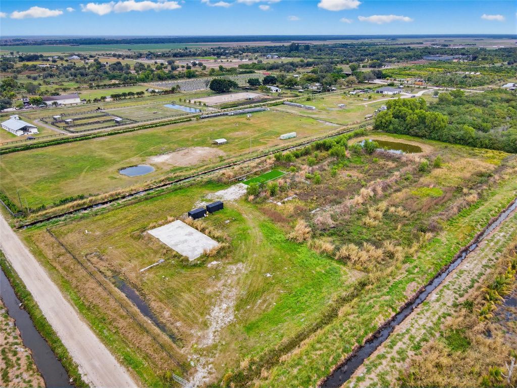 Photo of 20223 Simone Drive, Loxahatchee, FL 33470 (MLS # F10541810)