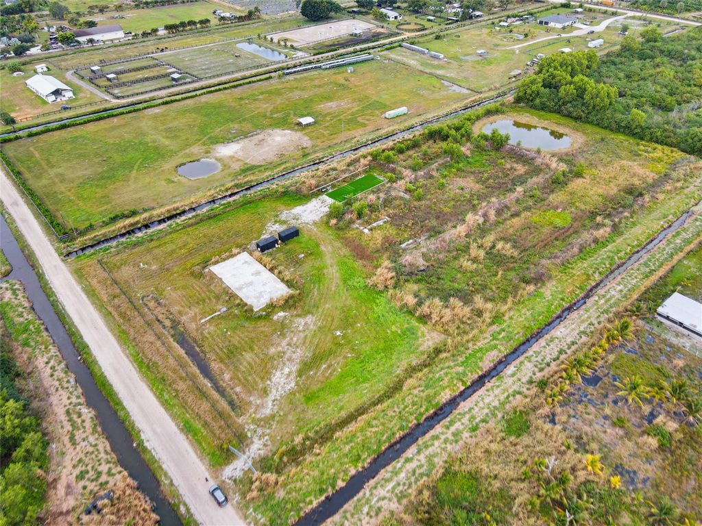 Photo of 20223 Simone Drive, Loxahatchee, FL 33470 (MLS # F10541810)