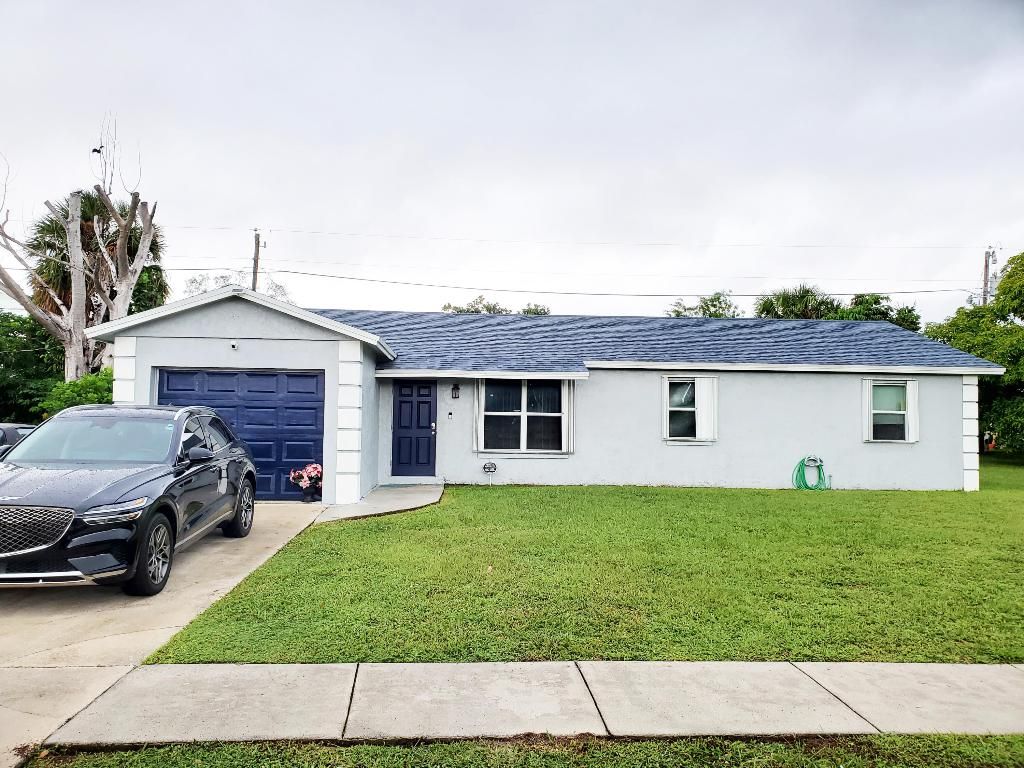 Photo of 1477 N Mangonia Drive, West Palm Beach, FL 33401 (MLS # R11135909)