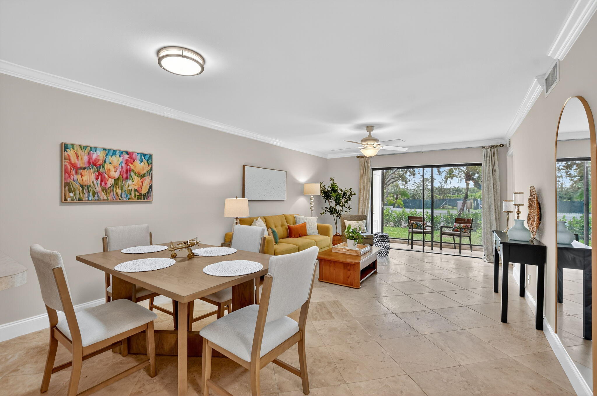 Don't miss this move-in ready, 1st floor condo in Boca Palms, ideally located in the heart of Boca Del Mar! This 2-bed, 2-bath condo features travertine tile flooring in the kitchen and living areas, with new vinyl flooring in the second bedroom, modern baseboards and crown molding throughout and updated bathrooms. Newer 2024 A/C unit, washer and dryer included and updated stainless steel appliances. Assigned parking, community pool and spa. Prime location near shopping, dining, highways, places of worship, and less than 5 miles to the beach. A-rated schools. Low quarterly fees includes roof maintenance, water, cable & exterior building insurance.