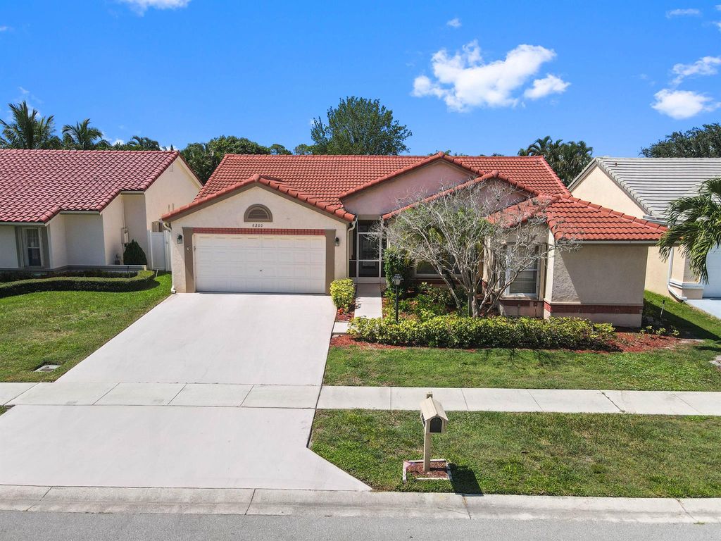 Photo of 8260 Lake Cypress Road, Lake Worth, FL 33467 (MLS # R11110095)