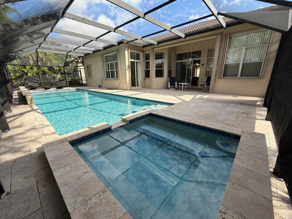 Photo of 10440 Cypress Lakes Preserve Drive, Wellington, FL 33449 (MLS # B26031561)