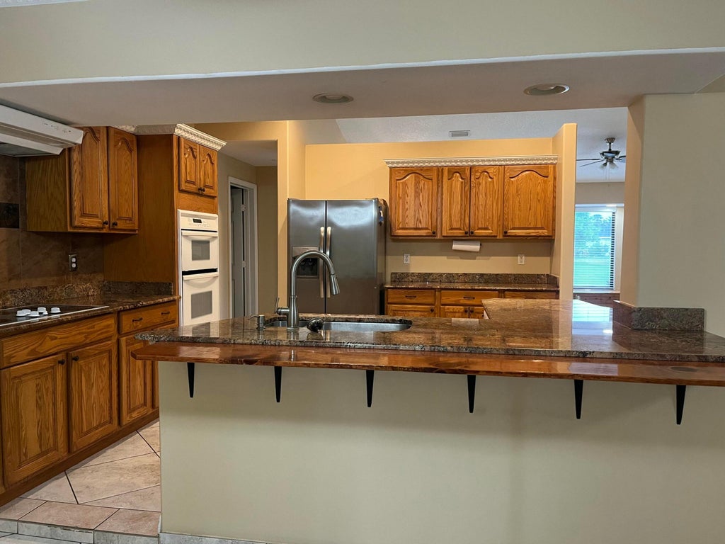 Photo of 1073 SW CANARY Terrace, Port Saint Lucie, FL 34953 (MLS # B26058336)