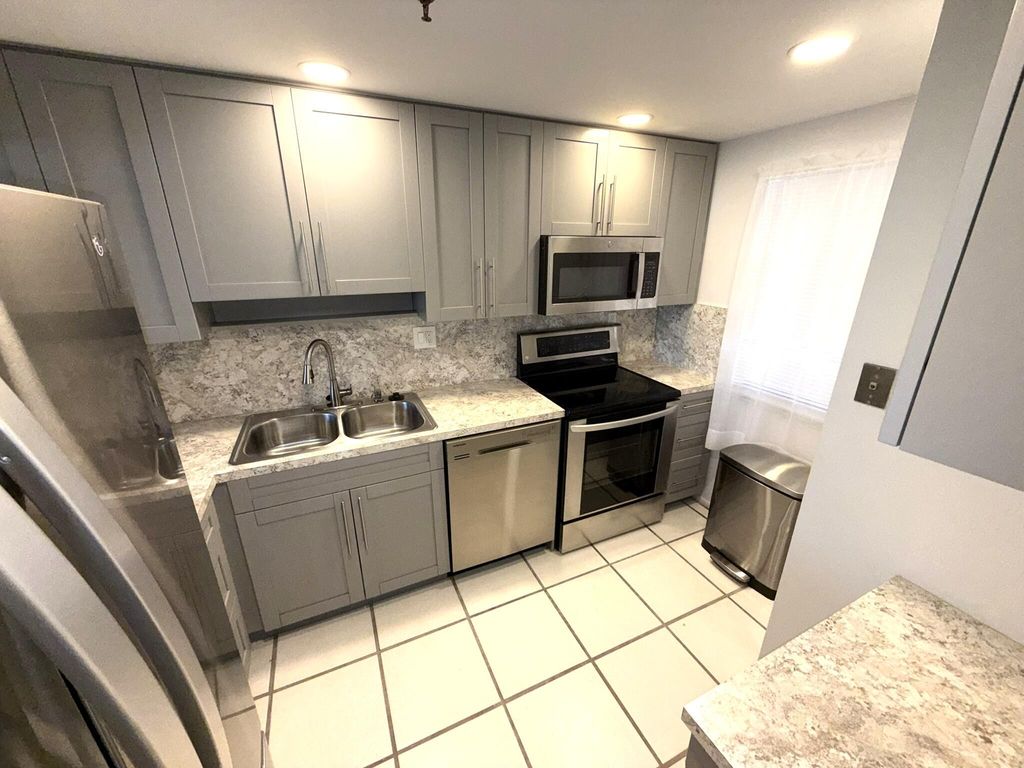 Photo of 2788 Tennis Club Drive #203, West Palm Beach, FL 33417 (MLS # R11147102)