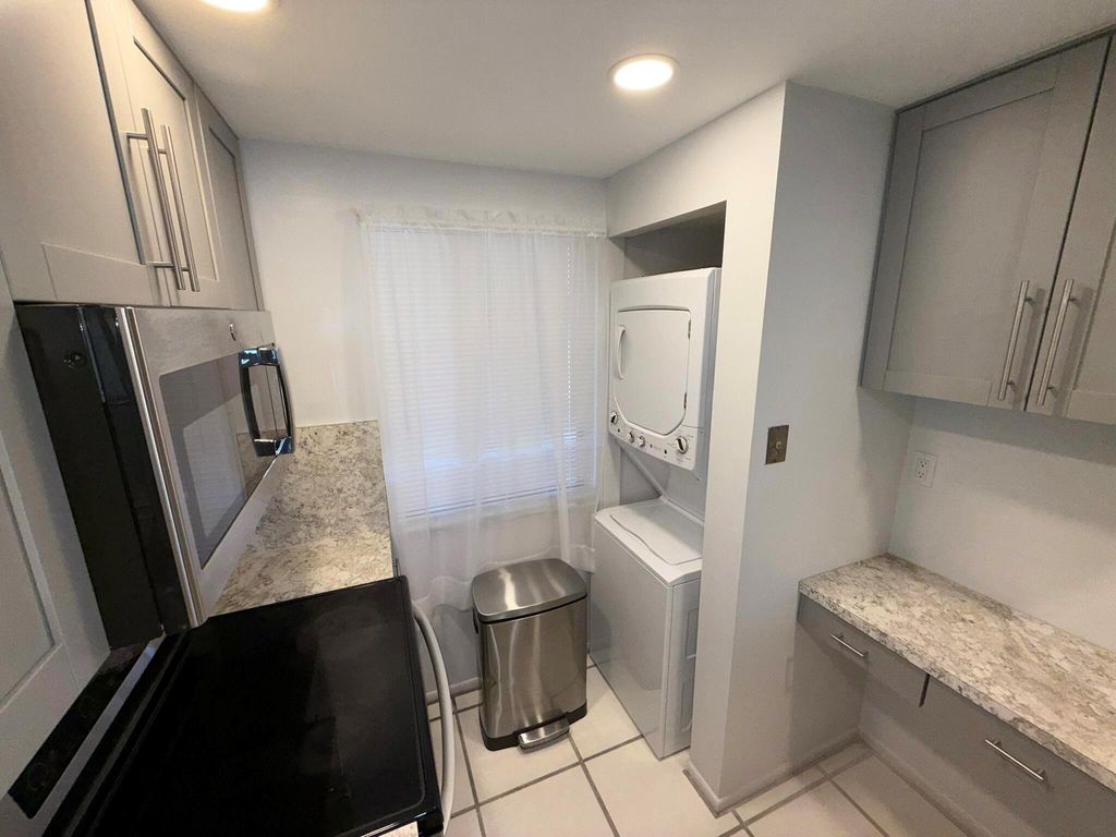 Photo of 2788 Tennis Club Drive #203, West Palm Beach, FL 33417 (MLS # R11147102)